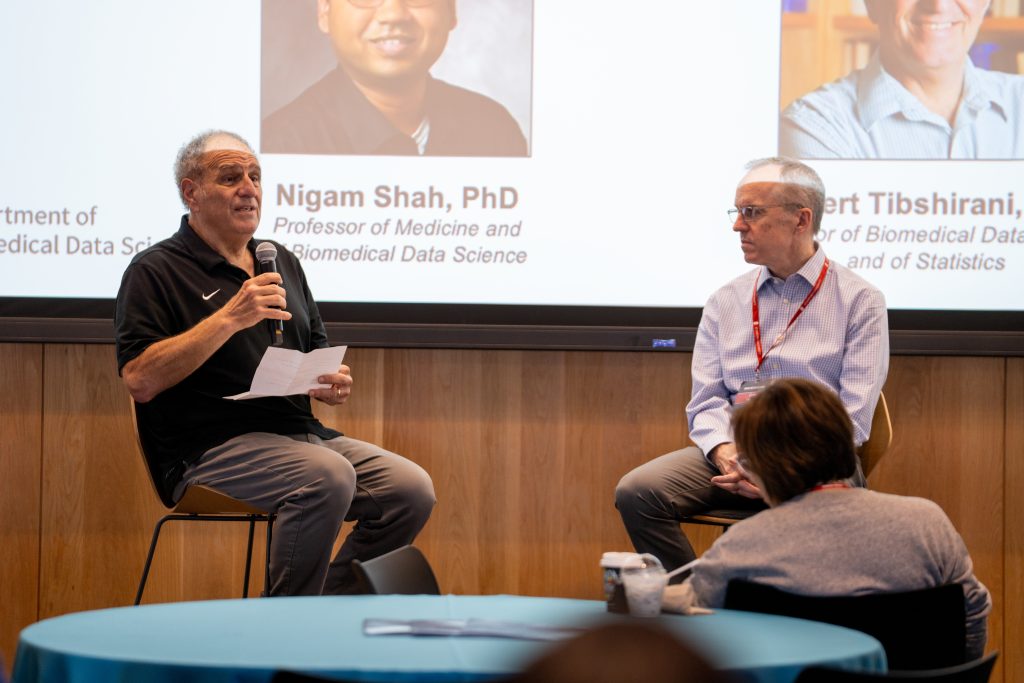 Rob Tibshirani and Curtis Langlotz debate during the 2026 DBDS Retreat.