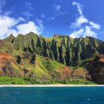 Jagged hills from catamaran at the dramatic Na Pali coast of Kauai, Hawaii Islands.